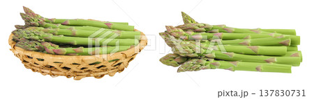 fresh asparagus in in a wicker basket isolated on white background fresh asparagus in in a wicker basket isolated on white background 137830731