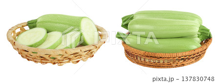 zucchini or marrow in a wicker basket isolated on white background with full depth of field 137830748