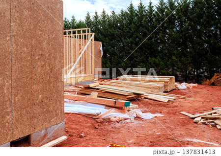 Construction site wooden materials ready for building in residential area 137831413
