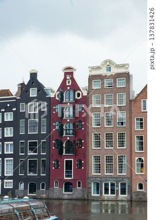Beautiful waterfront with multicolored buildings at Prinsengracht, Amsterdam Beautiful waterfront with multicolored buildings at Prinsengracht, Amsterdam 137831426