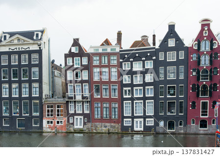 Beautiful waterfront with multicolored buildings at Prinsengracht, Amsterdam Beautiful waterfront with multicolored buildings at Prinsengracht, Amsterdam 137831427