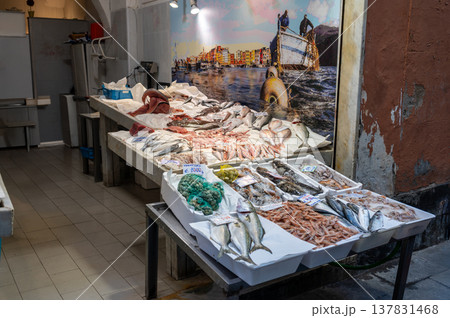 Genoa, liguria, italy. May 18, 2024. Genoa seafood stall showcasing vibrant fresh fish, shrimp and shellfish on ice at a bustling ligurian street market, italy Genoa, liguria, italy. May 18, 2024. Genoa seafood stall showcasing vibrant fresh fish, shrimp and shellfish on ice at a bustling ligurian street market, italy 137831468