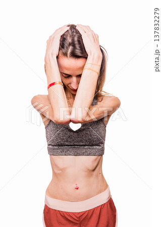 Woman experiencing body image anxiety and eating disorder Woman experiencing body image anxiety and eating disorder 137832279