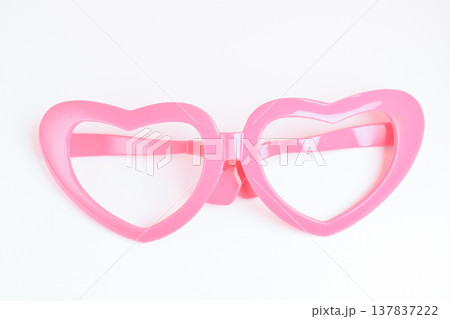 pink heart shape of glasses on white background 137837222