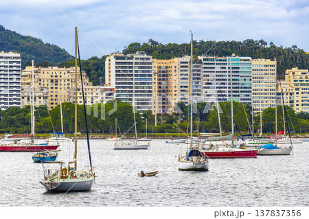 Urca coast beach promenade with boats Rio de Janeiro Brazil. Urca coast beach promenade with boats Rio de Janeiro Brazil. 137837356