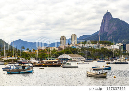 Urca coast beach promenade with boats Rio de Janeiro Brazil. Urca coast beach promenade with boats Rio de Janeiro Brazil. 137837363