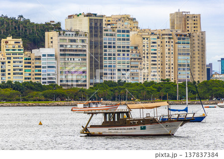 Urca coast beach promenade with boats Rio de Janeiro Brazil. Urca coast beach promenade with boats Rio de Janeiro Brazil. 137837384