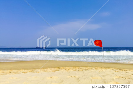 Red Flag on Copacabana Leme Beach Rio de Janeiro Brazil. Red Flag on Copacabana Leme Beach Rio de Janeiro Brazil. 137837597