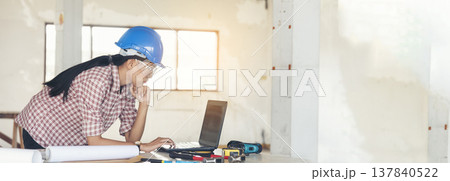 Banner Woman engineer entrepreneur construction industry worker. Banner Female engineer working refinery oil plant manufacturing. Civil engineering construction hard hat safety helmet with copy space 137840522