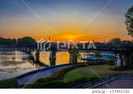 Landscape of Bridge River Kwai at Kanchanaburi, Thailand in sunset time. Is a famous place and a tourist destination 137842192
