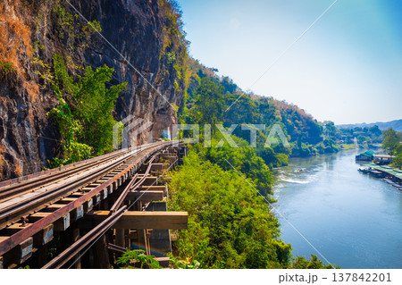 The Death Railway crossing kwai river with Krasae Cave in Kanchanaburi Thailand. Important landmark and destination to visiting and world war II history builted 137842201