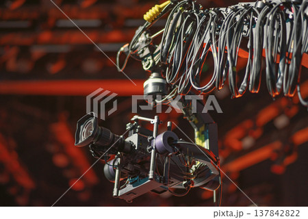 Professional Cinema Camera on Robotic Crane Jib at Concert Stage with copy space 137842822