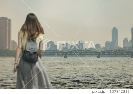 Woman Traveler Looking at Cairo City Skyline and Nile River 137842832