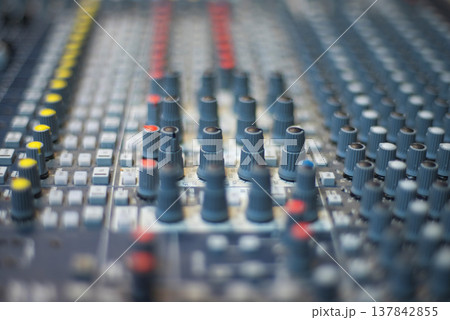 Close-up of Professional Analog Audio Mixing Console Knobs with copy space Close-up of Professional Analog Audio Mixing Console Knobs with copy space 137842855