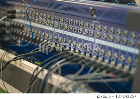 Professional Sound Mixer Back Panel with Connected Cables in Studio with copy space 137842857