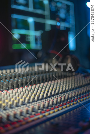 Professional Mixing Console and Headphones in Creative Studio with copy space 137842874