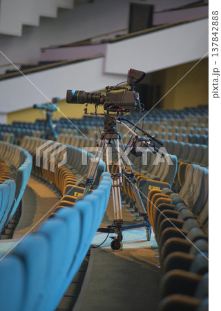 Professional broadcasting camera in empty auditorium for live event with copy space 137842888