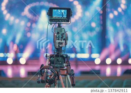 Professional Broadcast TV Camera on Tripod at Live Concert with Copy Space Professional Broadcast TV Camera on Tripod at Live Concert with Copy Space 137842911