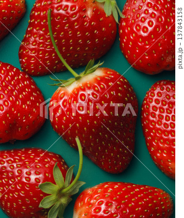 Fresh Strawberries Pattern on Teal Background Fresh Strawberries Pattern on Teal Background 137843158