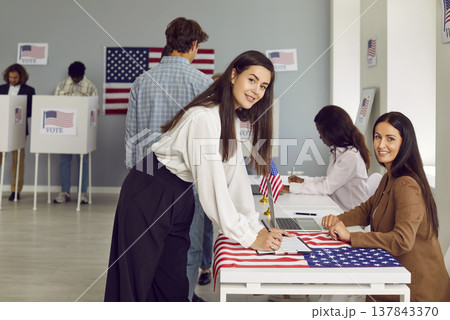 Young woman came to polling station to vote in elections in United States of America. Young woman came to polling station to vote in elections in United States of America. 137843370