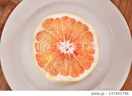Grapefruit cutted in half Grapefruit cutted in half 137843746