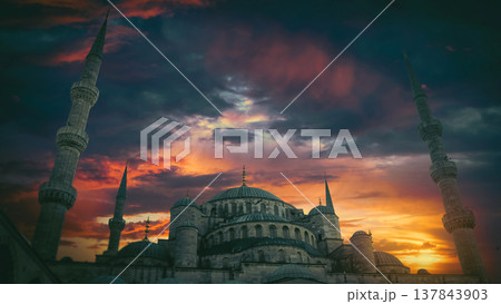 Blue Mosque in Istanbul under dramatic fiery sunset sky with copy space 137843903