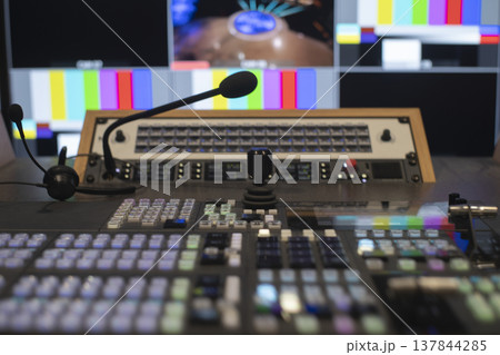 Video switcher and microphone in broadcasting control room with copy space 137844285