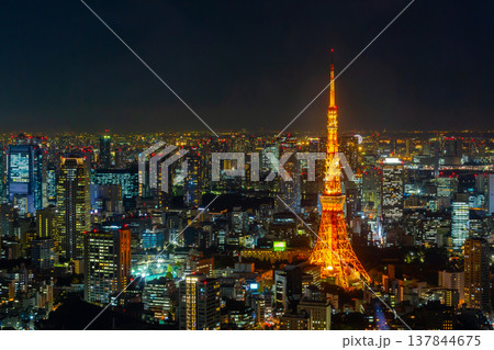 Tokyo skyline at night, with its tall buildings and beautiful lights, is a popular destination for tourists from all over the world and is an important business and economic city. Tokyo skyline at night, with its tall buildings and beautiful lights, is a popular destination for tourists from all over the world and is an important business and economic city. 137844675