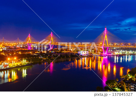 Bhumibol Bridge decorate with beautiful colored lights is a bridge across the Chao Phraya River for the Industrial Ring Road Kanchanaphisek Road Samut Prakan Thailand Bhumibol Bridge decorate with beautiful colored lights is a bridge across the Chao Phraya River for the Industrial Ring Road Kanchanaphisek Road Samut Prakan Thailand 137845327