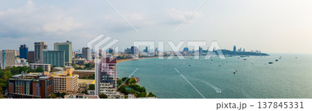 Panoramic view of Pattaya city from high angle with beach and buildings. It is a landmark and popular tourist destination. 137845331