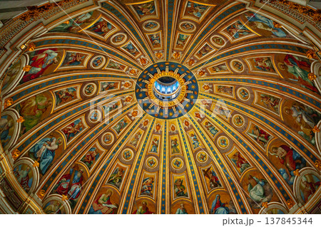 Beautiful dome with many detailed paintings in a large building Beautiful dome with many detailed paintings in a large building 137845344
