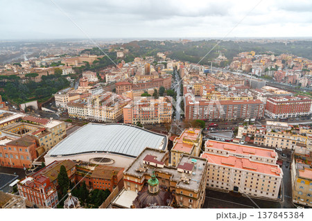 View of city buildings and streets in Rome during cloudy weather with some rain View of city buildings and streets in Rome during cloudy weather with some rain 137845384