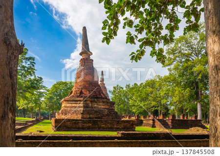 Landmark of old chedi made of ancient bricks in the Kamphaeng Phet Historical Park, Thailand. 137845508