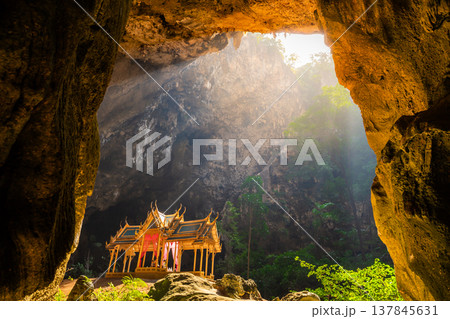 Amazing Phraya Nakhon cave in Khao Sam Roi Yot national park at Prachuap Khiri Khan Thailand is small temple in the sun rays in cave. Amazing Phraya Nakhon cave in Khao Sam Roi Yot national park at Prachuap Khiri Khan Thailand is small temple in the sun rays in cave. 137845631