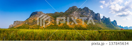 Beautiful Panorama landscape of mountain with grass field and blue sky range background in Khao Sam Roi Yot National Park, Kui Buri District, Prachuap Khiri Khan, Thailand 137845634