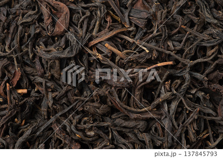 Pile of black tea isolated on white background. Pile of black tea isolated on white background. 137845793
