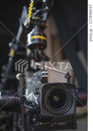 Professional Cinema Camera on Robotic Crane in Studio with Copy Space Professional Cinema Camera on Robotic Crane in Studio with Copy Space 137846037