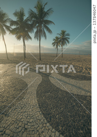Sunrise at Copacabana Beach with Iconic Wave Mosaic and Palms with copy space. Sunrise at Copacabana Beach with Iconic Wave Mosaic and Palms with copy space. 137846047