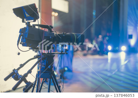 Professional Broadcast Video Camera on Tripod at Live Event with Copy Space Professional Broadcast Video Camera on Tripod at Live Event with Copy Space 137846053