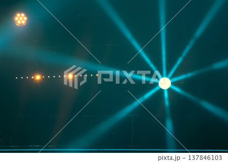 Abstract Stage Spotlight with Radial Teal Beams and Warm Accents with copy space Abstract Stage Spotlight with Radial Teal Beams and Warm Accents with copy space 137846103