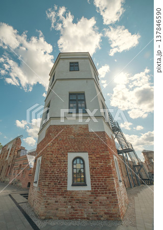 Restored Northern tower of Halshany Castle against sunny sky with copy space 137846590