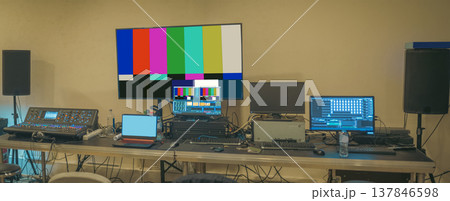 Professional live streaming control room setup with audio mixer and color bars with copy space Professional live streaming control room setup with audio mixer and color bars with copy space 137846598