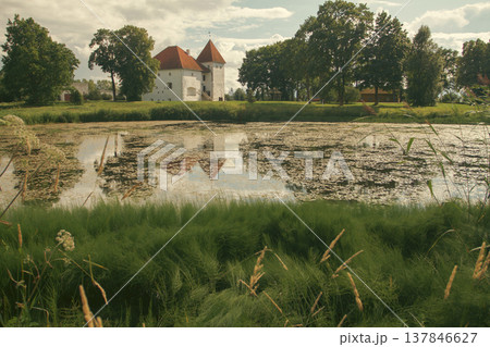 Medieval Purtse Castle in Estonia with Lake Reflection and Copy Space 137846627