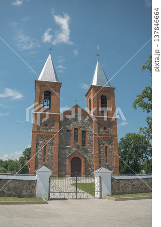 Neo-Romanesque Church of Saints Simeon and Tadeusz in Lazduny with copy space 137846664