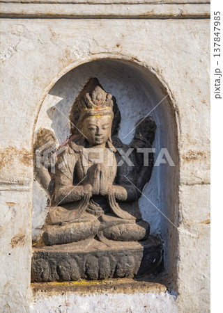 Ancient Hindu Deity Statue in Stone Niche Nepal with Copy Space Ancient Hindu Deity Statue in Stone Niche Nepal with Copy Space 137847985
