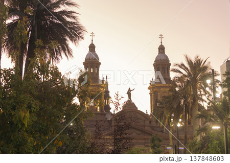 Santiago Metropolitan Cathedral at Sunset with Palm Trees and Large Sky Copy Space Santiago Metropolitan Cathedral at Sunset with Palm Trees and Large Sky Copy Space 137848603