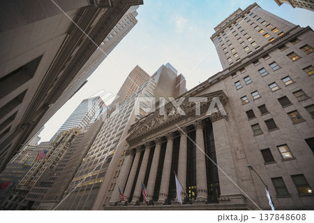 New York Stock Exchange NYSE Building with Skyscrapers and Sky Copy Space in Manhattan New York Stock Exchange NYSE Building with Skyscrapers and Sky Copy Space in Manhattan 137848608