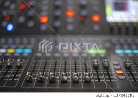 Professional Digital Mixing Console with Deep Bokeh and Copy Space Professional Digital Mixing Console with Deep Bokeh and Copy Space 137848795