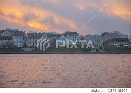 Trinity Suburb at Dawn with Pink Sky and River Reflection Background for Text 137848805