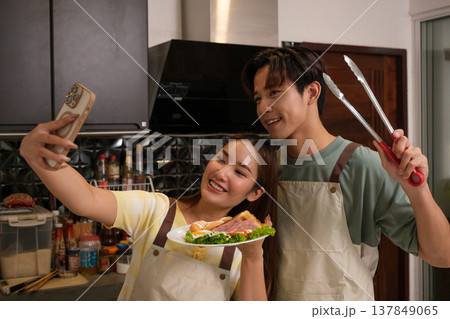 Asian couple at home Asian couple at home 137849065